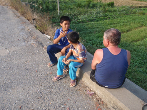Two kids show up, one of the kids has his own pack of cigarettes and lighter.